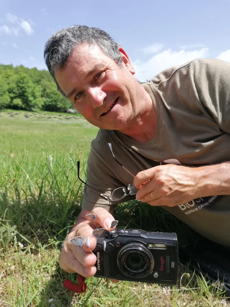 Author and naturalist Mark Cocker with camera and butterflies